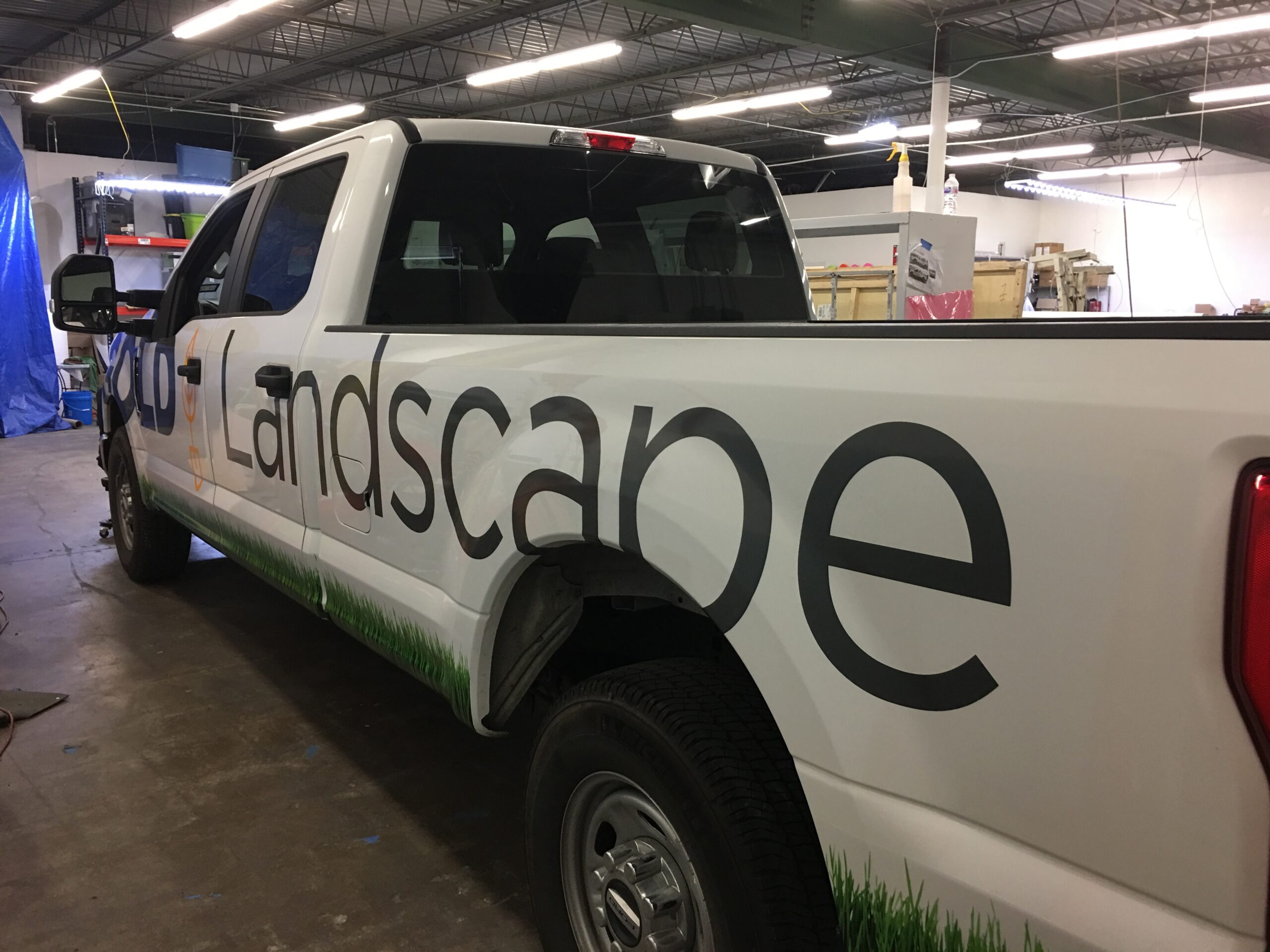 Billboard spot graphics and vinyl lettering