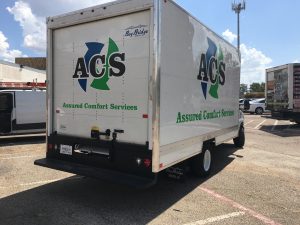 Box truck three color logo wrap with Assured Comfort Services logo design. Back door and passenger side.