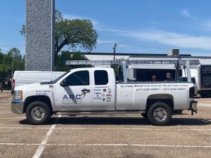 Original Alpine Roofing designed trucks