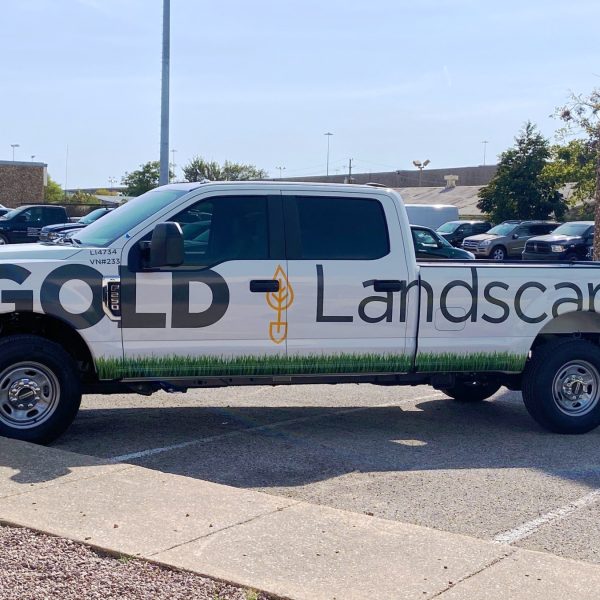 goldlandscape-truck-after Spot graphics on a white color truck